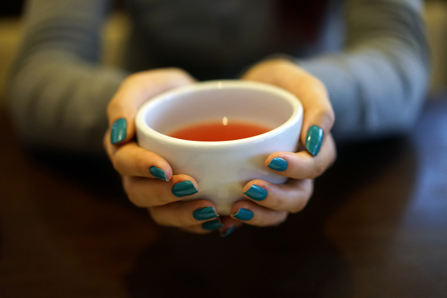 Cup of Tea in Female Hands